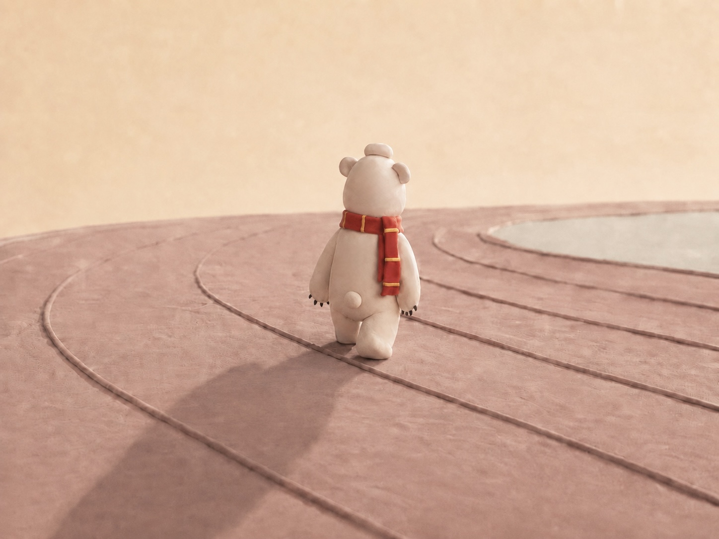 Lonely Bear walking alone through long shadows
